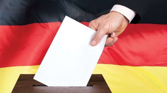 Germany's ruling conservatives move up in polls
